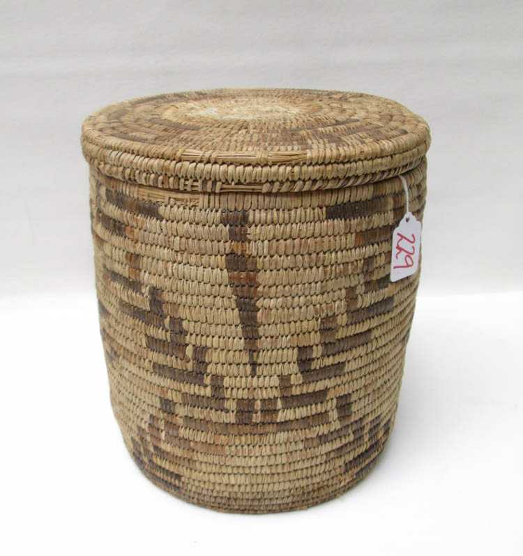 Appraisal: SOUTHWEST NATIVE AMERICAN COVERED BASKET tall lidded coil storage basket