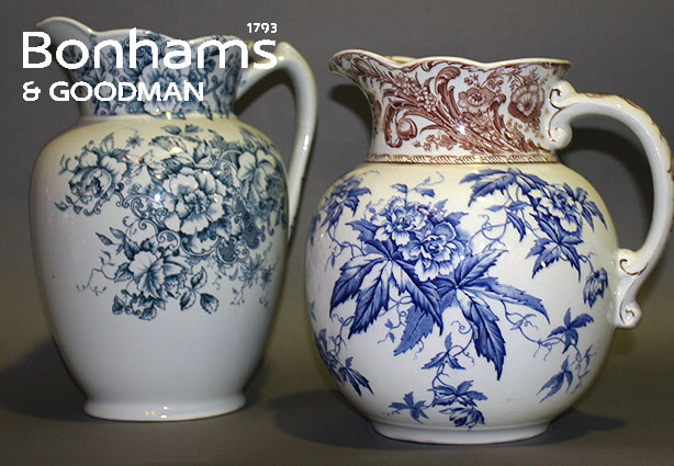 Appraisal: Two English ceramic water jugs depicting flowers