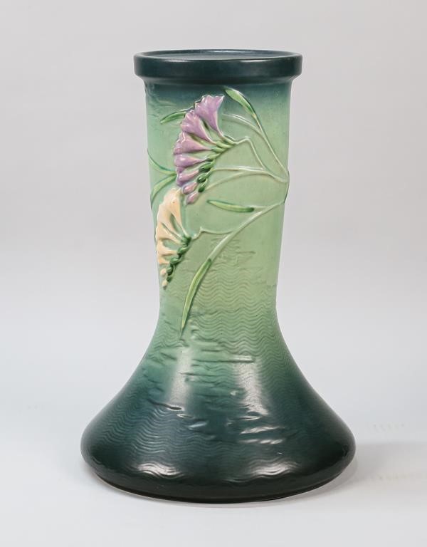 Appraisal: Roseville Freesia green pottery pedestal jardiniere base Marked on the