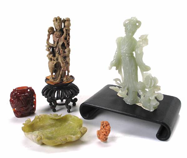 Appraisal: A group of five Chinese hardstone carvings comprising a soapstone