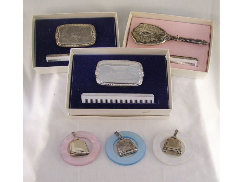 Appraisal: Sterling Childs Lot Includes Three teething rings with sterling accents