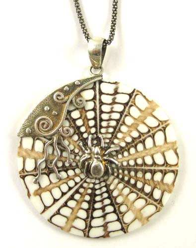 Appraisal: STERLING SILVER AND SHELL PENDANT NECKLACE having a silver mounted