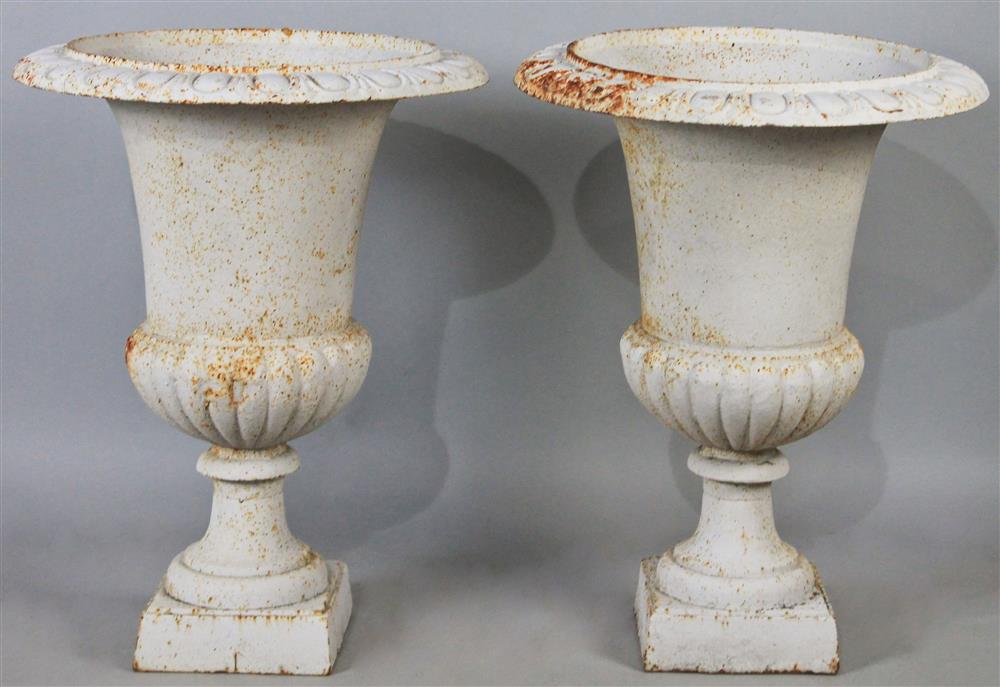 Appraisal: PAIR OF CAST IRON WHITE PAINTED PLANTERS pair of campana