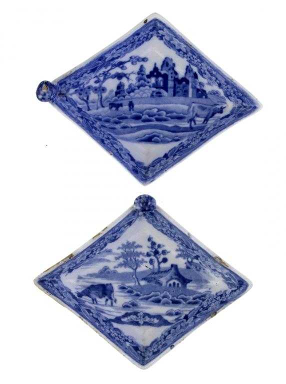 Appraisal: TWO BLUE PRINTED EARTHENWARE PICKLE DISHES of lozenge shape landscapes