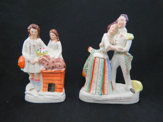 Appraisal: Staffordshire Pottery Figurines mother daughter with rabbit and soldier's return