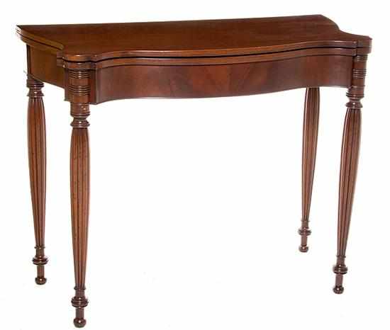 Appraisal: American Sheraton mahogany card table Massachusetts circa shaped top with