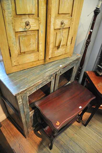 Appraisal: A DISTRESSED GREEN AND BROWN PAINTED LOW CABINET