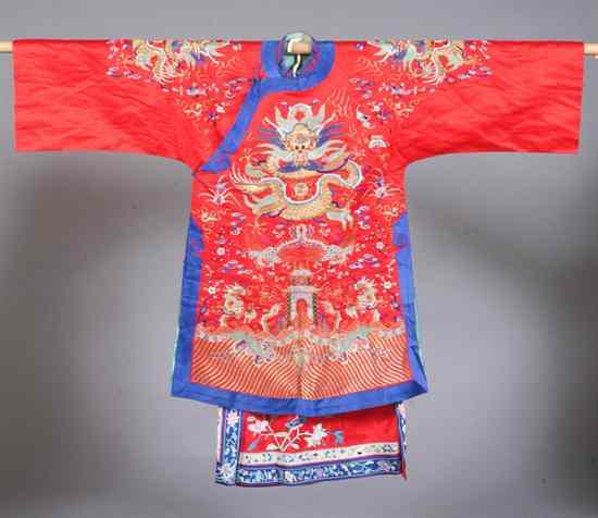 Appraisal: CHINESE EMBROIDERED RED SILK DRAGON JACKET AND SKIRT Worked in