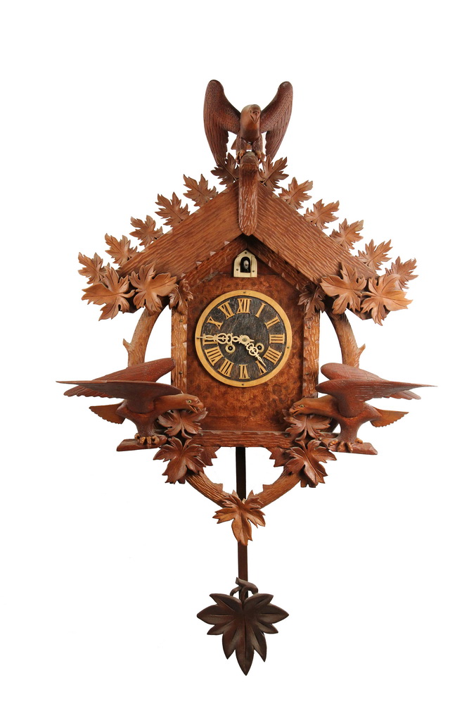 Appraisal: FOLK ART CUCKOO CLOCK Cuckoo Clock featuring three oversized American