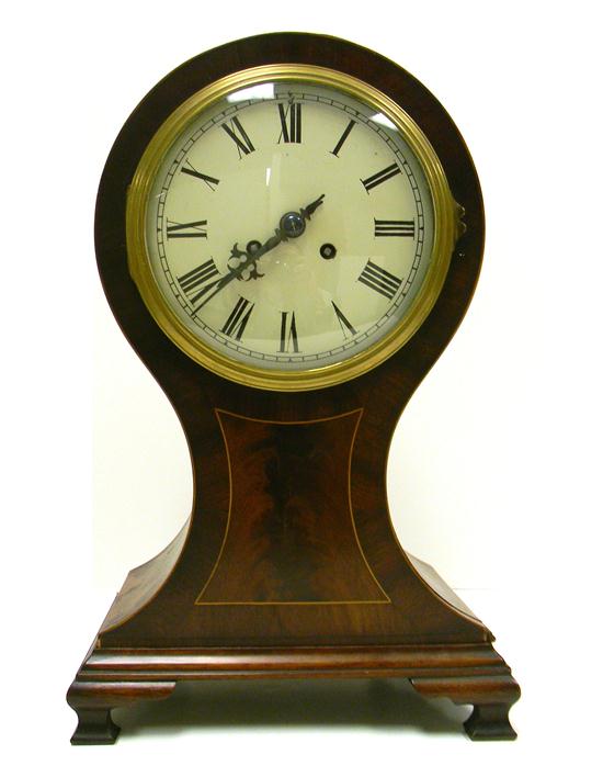 Appraisal: French Balloon clock circa - wood construction with veneer brass