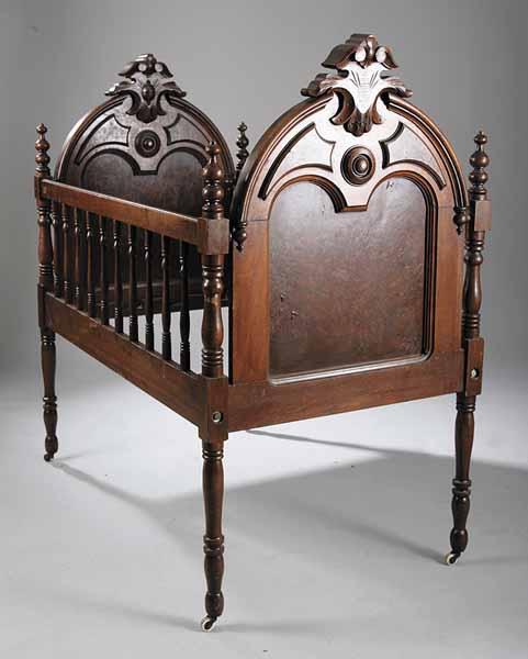 Appraisal: An American Renaissance Walnut and Burled Baby Crib mid- th