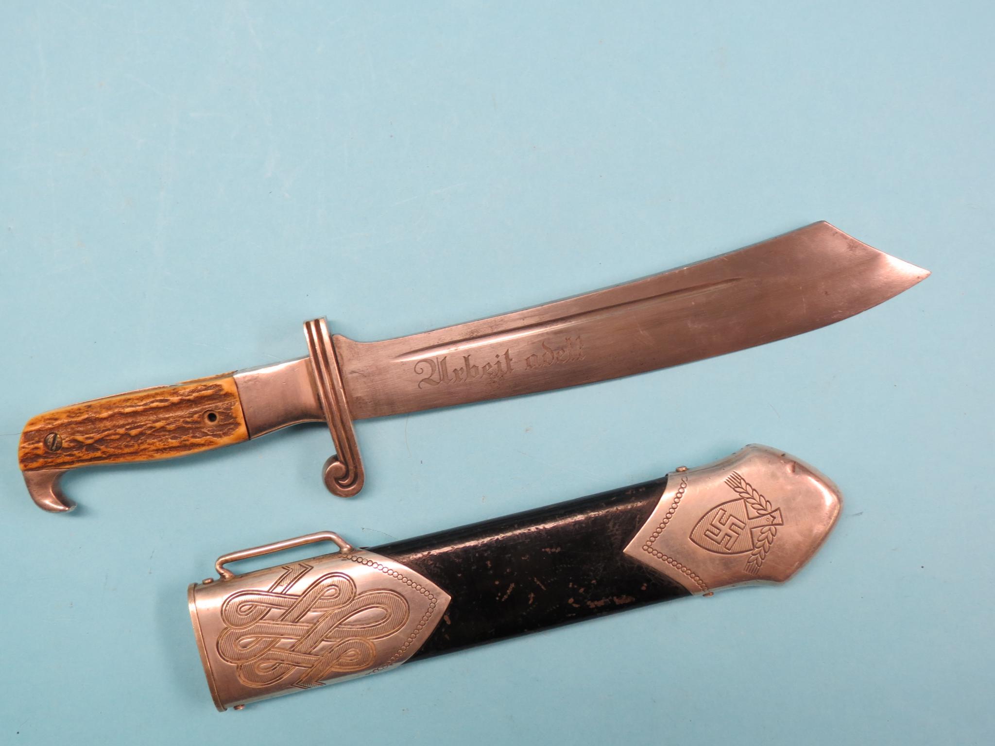 Appraisal: A Third Reich RAD subordinate's dagger in scimitar-shape blade stamped