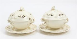 Appraisal: A Pair of Reticulated Creamware Tureens on Stands Width at