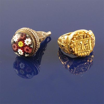 Appraisal: An unusual gold ring engraved with an Aztec style mask