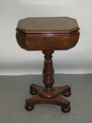 Appraisal: A VICTORIAN MAHOGANY TEAPOY of canted oblong form the hinged