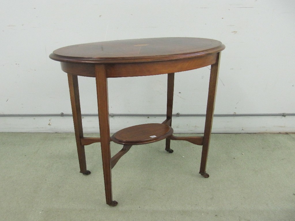 Appraisal: An Edwardian mahogany inlaid oval occasional table raised on tapering