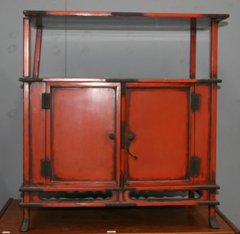 Appraisal: A Chinese red lacquered side cabinet x x damaged together