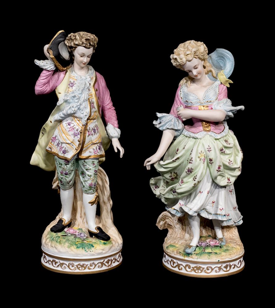 Appraisal: A Pair of Continental Bisque Figures A Pair of Continental