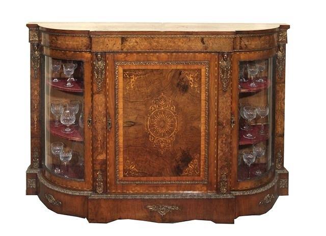 Appraisal: A VICTORIAN WALNUT AND INLAID CREDENZA with central cross-banded panel