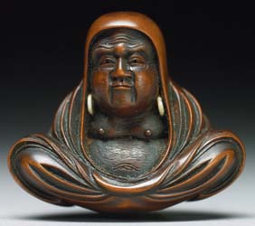 Appraisal: ANTIQUE WOOD NETSUKE Finely carved and antique wood netsuke of