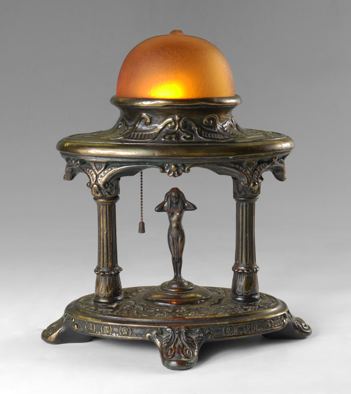 Appraisal: ART DECO STYLE TABLE LAMP Patinated metal clad over composite