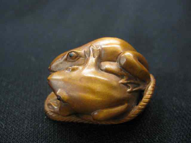 Appraisal: Carved Boxwood Netsuke of Two Frogs ina sandal '' excellent