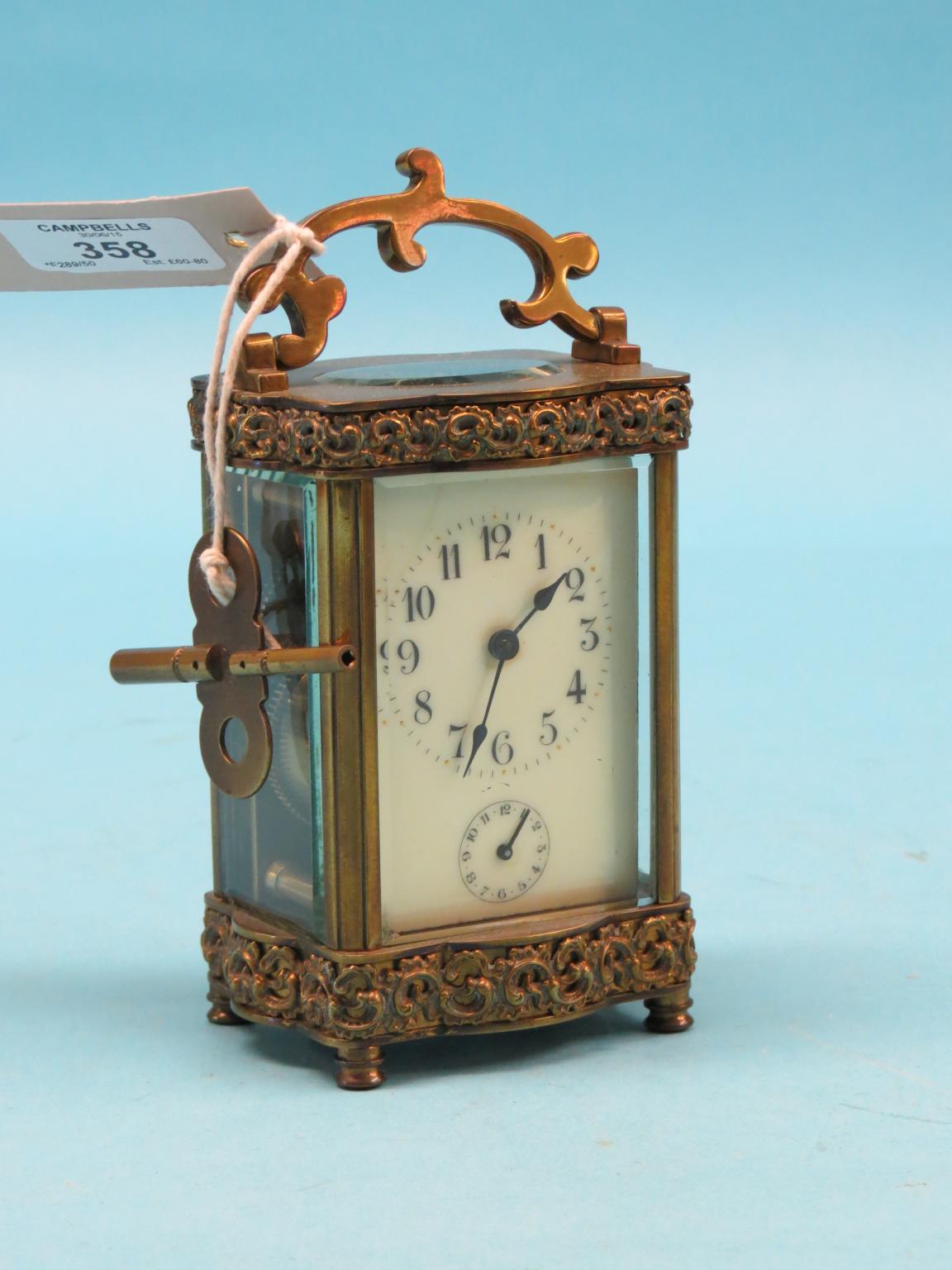 Appraisal: A French brass carriage clock with enamelled dial and timepiece