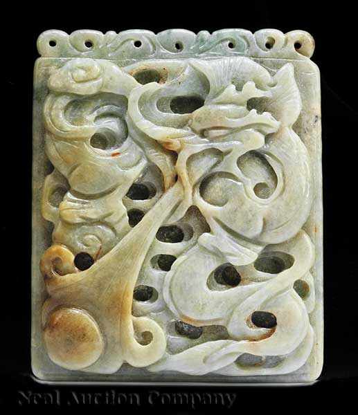 Appraisal: A Chinese Celadon and Russet Jade Plaque splayed rectangular form