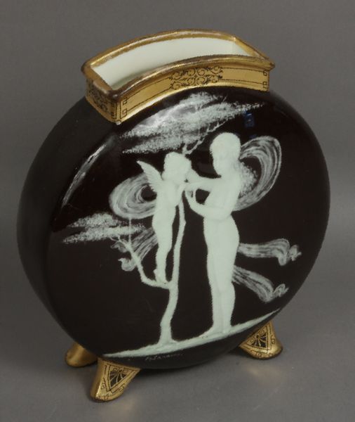 Appraisal: th Century English pate-sur-pate moon-shaped footed vase depicting cherub and