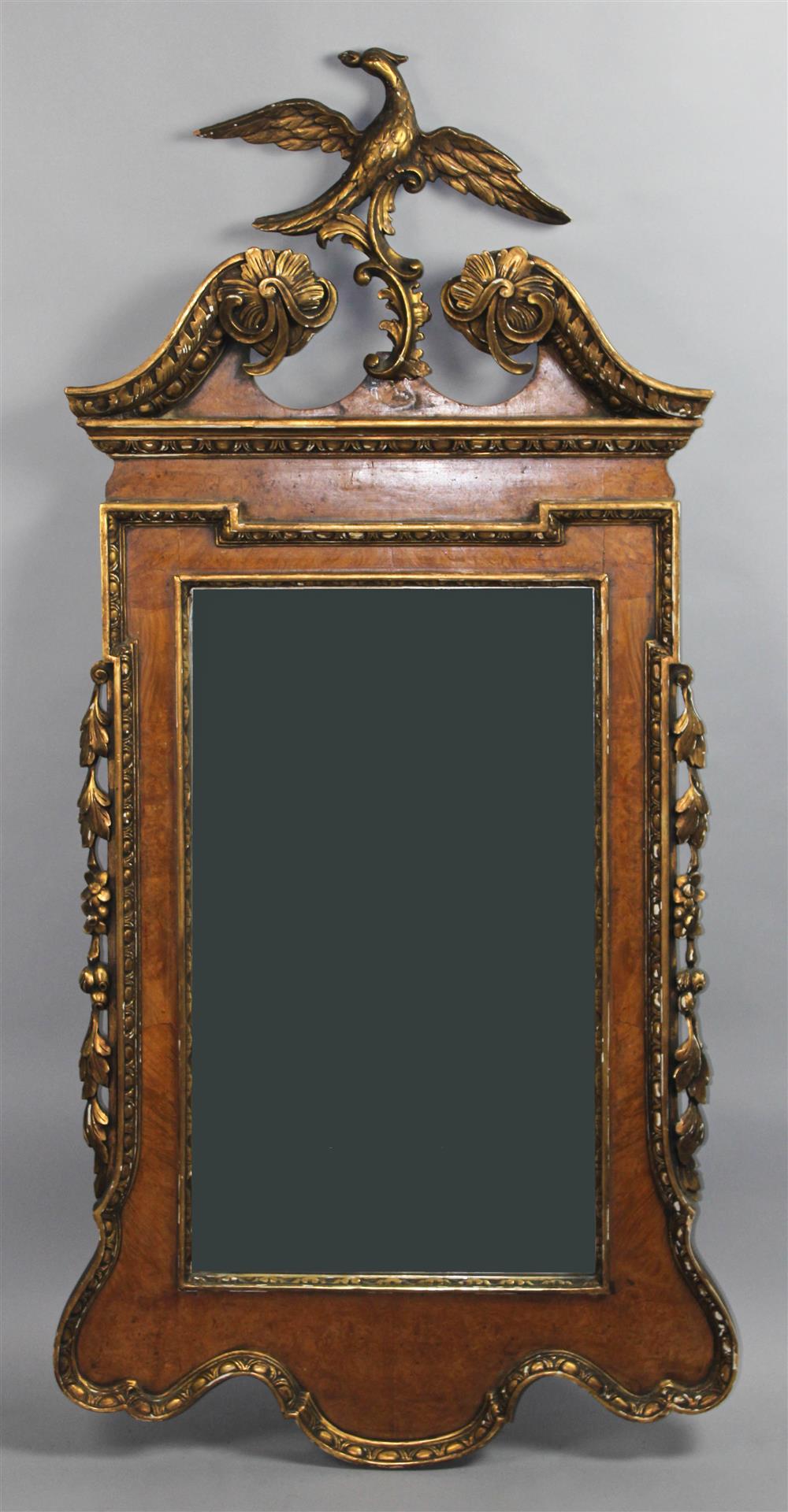 Appraisal: CHIPPENDALE STYLE BURLED WALNUT AND GILT MIRROR together with carved