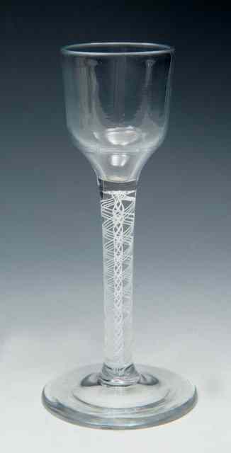 Appraisal: A FUNNEL BOWL WINE GLASS on DSOT stem and conical