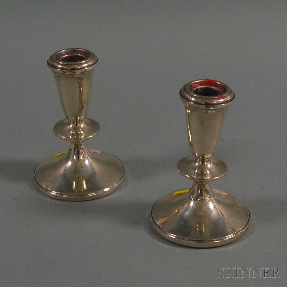 Appraisal: Pair of Weighted Sterling Silver Candleholders lacking maker's mark ht