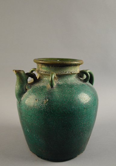 Appraisal: A Chinese Green Glazed Water Jug with an applied handle