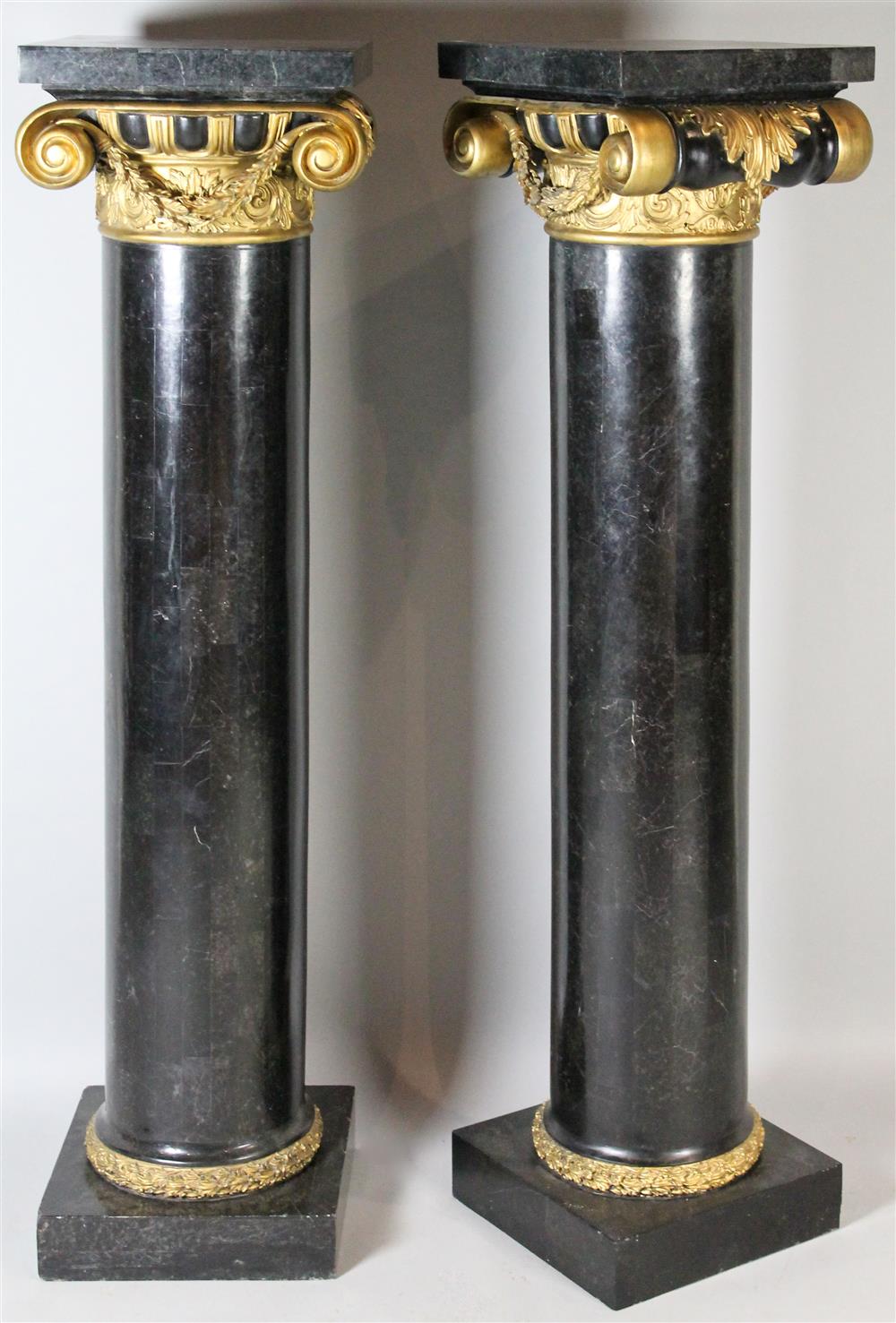 Appraisal: PAIR OF TILED MARBLE AND GILT IONIC COLUMNS OR PEDESTALS