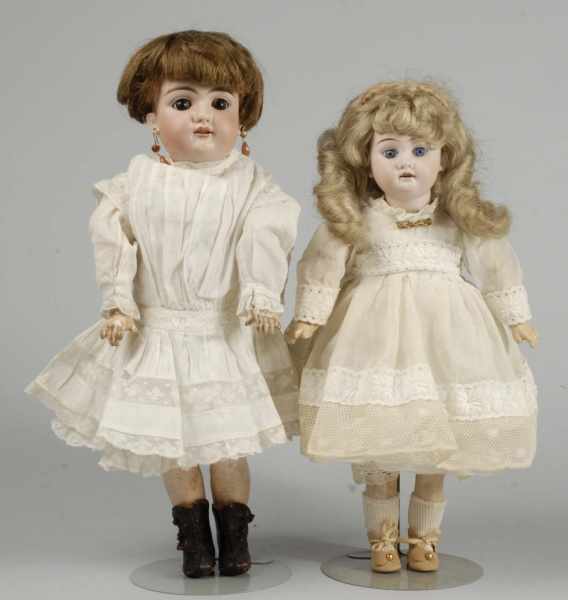 Appraisal: Lot of German Bisque Child Dolls Description Both with bisque