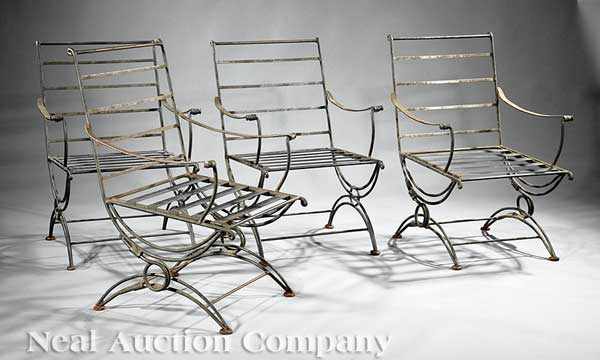 Appraisal: A Suite of Four Hand-Wrought Iron Garden Chairs in the