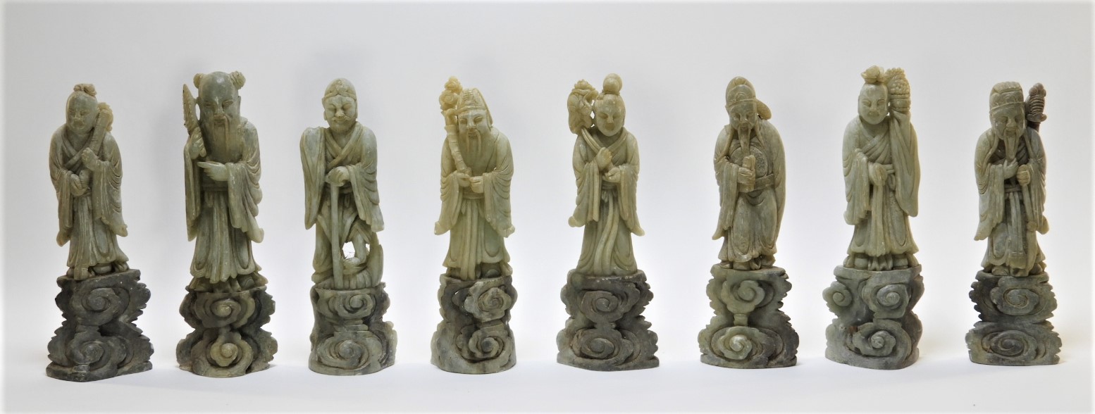 Appraisal: CHINESE CARVED SOAPSTONE IMMORTAL DEITY FIGURES China th CenturyFinely carved