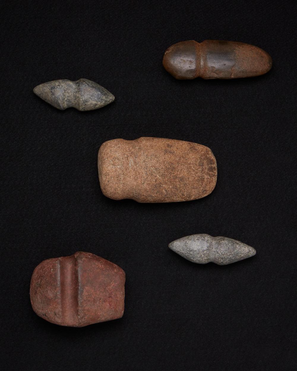 Appraisal: A group of carved stone axes Pre-historic or later Comprising