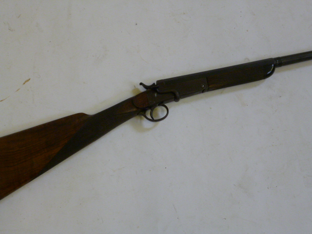 Appraisal: A SINGLE BARRELLED SHOTGUN early th century barrel partly octagonal