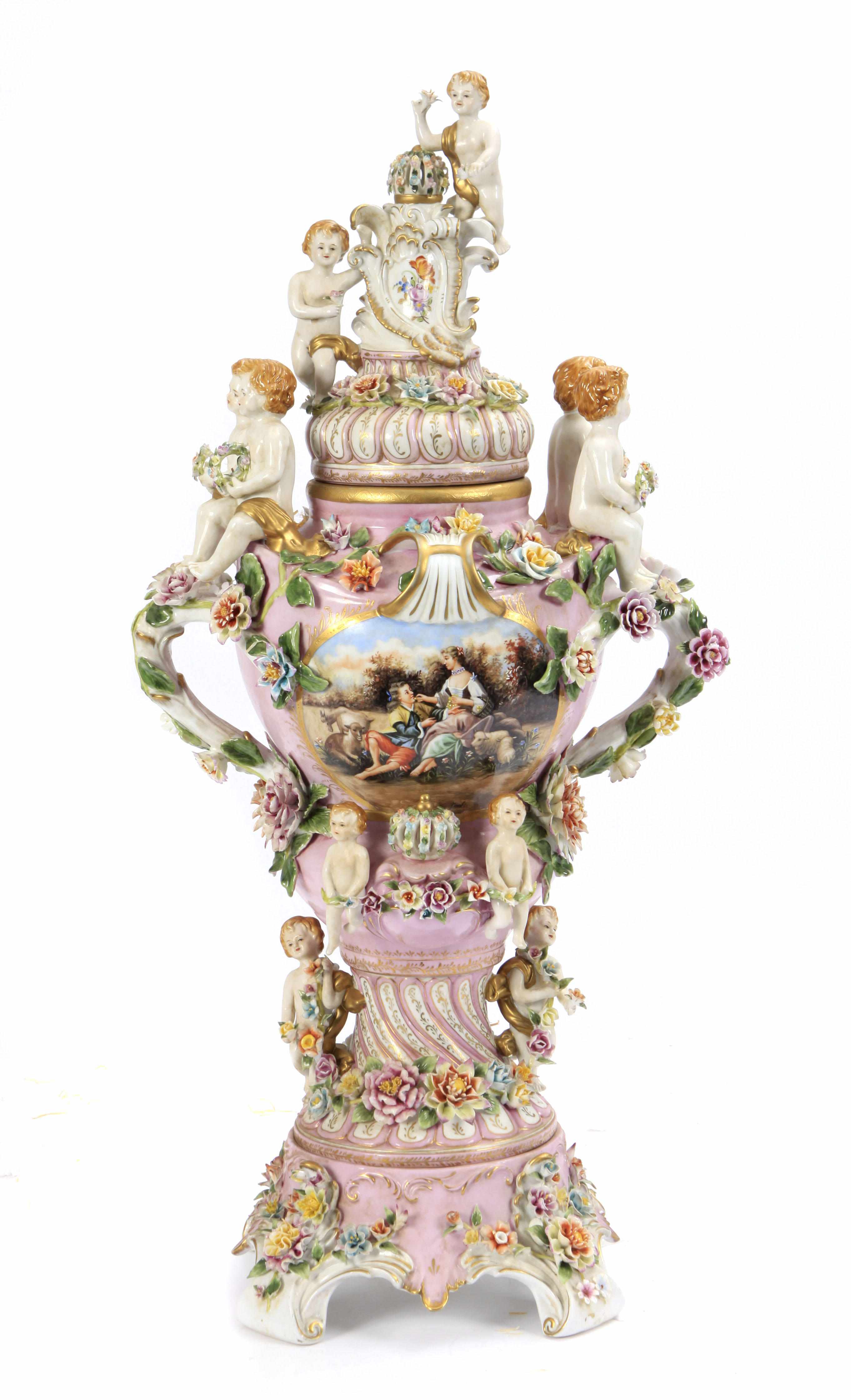 Appraisal: A German Rococo style porcelain covered urn height in diameter