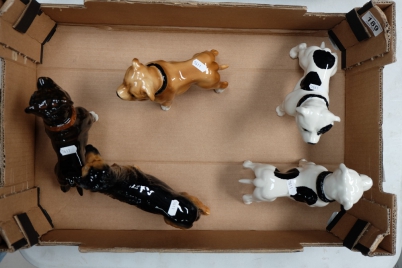 Appraisal: A collection of unmarked ceramic figures of dogs