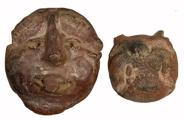 Appraisal: TWO ANCIENT PRE-COLUMBIAN CLAY MASKS with humorous visages cm and