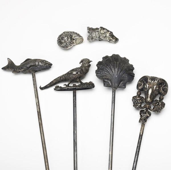 Appraisal: FIGURAL SILVER MINIATURES Grouping of six includes four French skewers