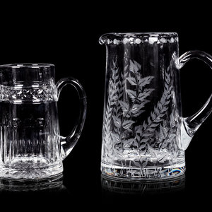 Appraisal: Two William Yeoward Glass Pitchers Height of taller example inches