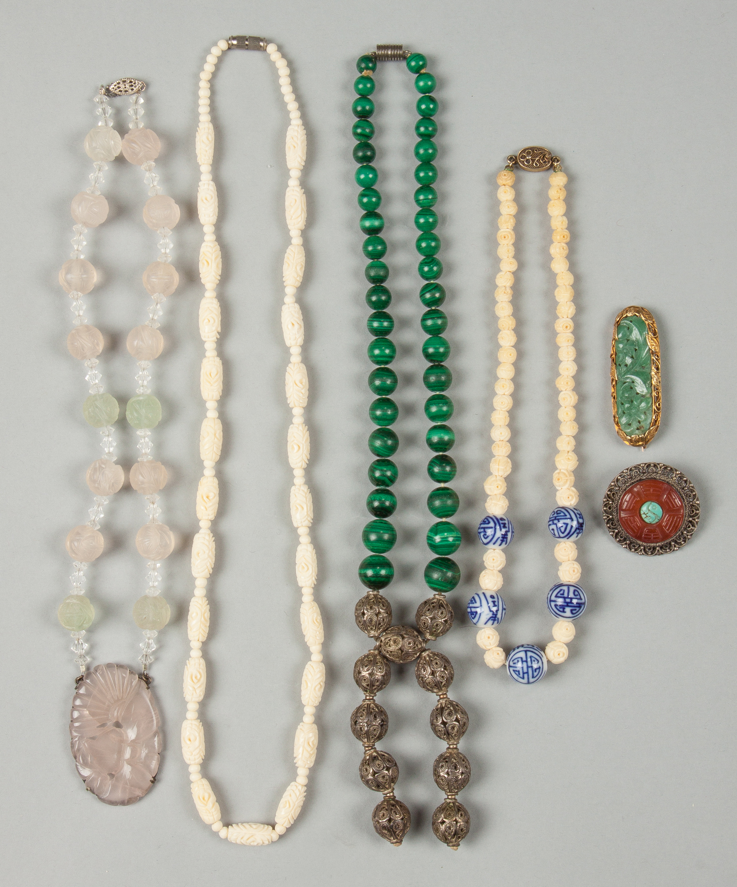 Appraisal: Group of Necklaces Brooches Glass bone malachite hardstone etc