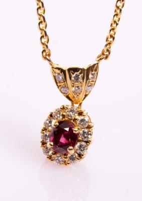 Appraisal: A ruby and diamond cluster pendant necklace the oval cluster