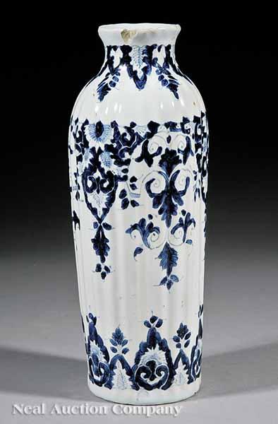 Appraisal: A French Faience Ribbed Baluster Vase th c in the