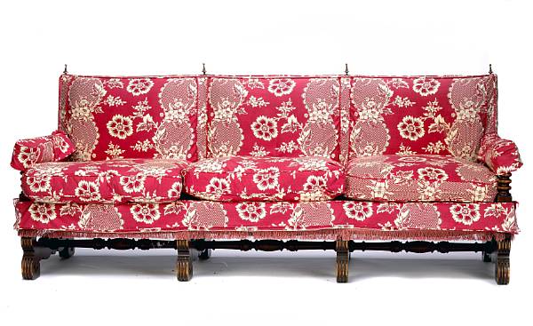 Appraisal: A Baroque style carved walnut and floral upholstered sofa height