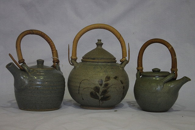 Appraisal: THREE STUDIO POTTERY TEAPOTS largest with impressed Cornwall mark to