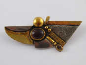 Appraisal: A gilt and white metal tests silver garnet brooch signed